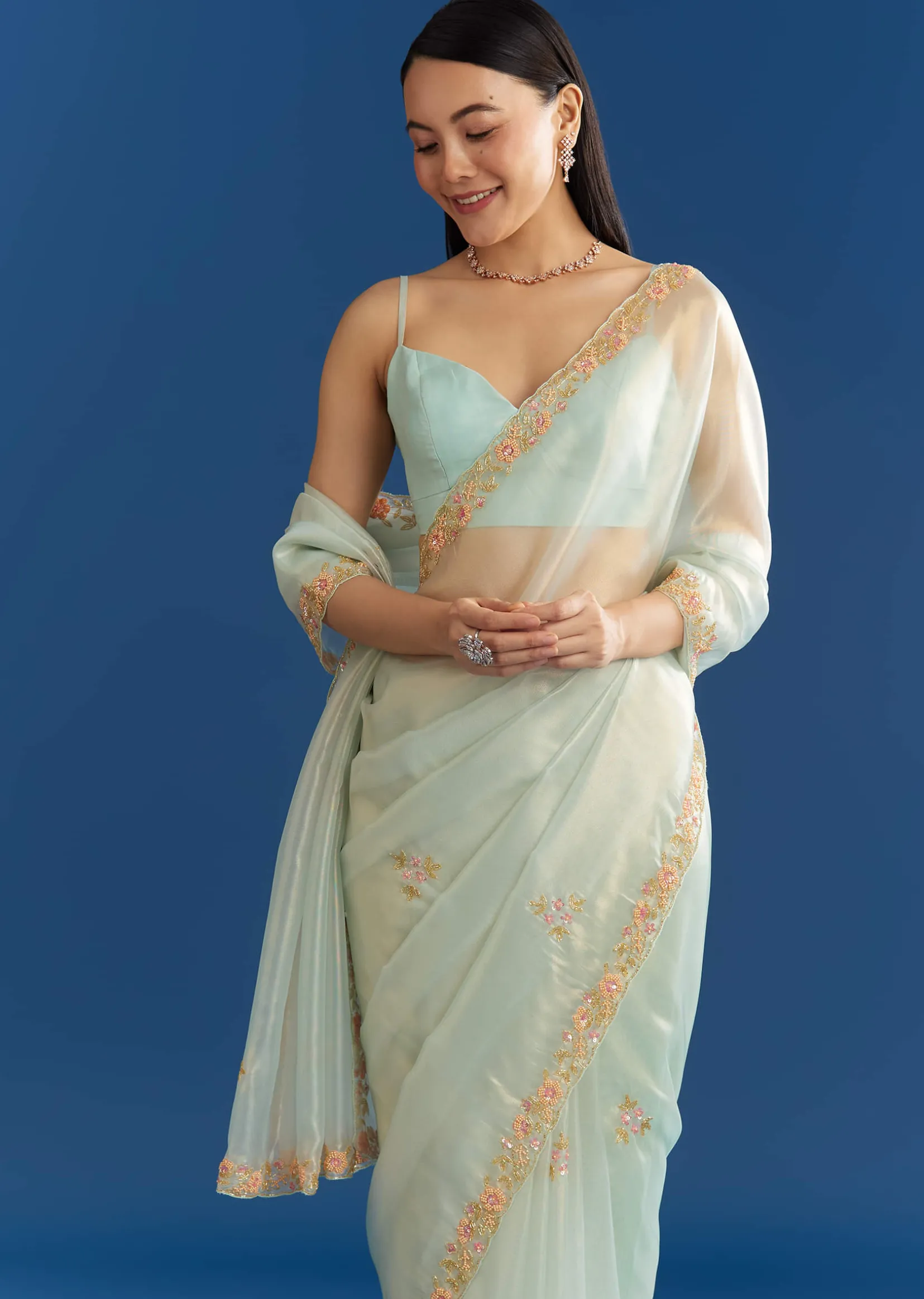 Aqua Blue Organza Tissue Saree With Multicolor Border