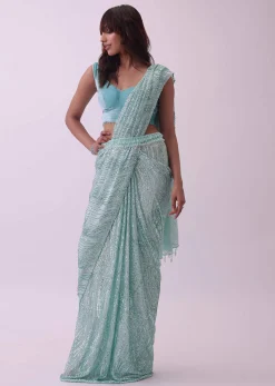 Aqua Blue Saree And Stitched Velvet Blouse With Hanging Crystals