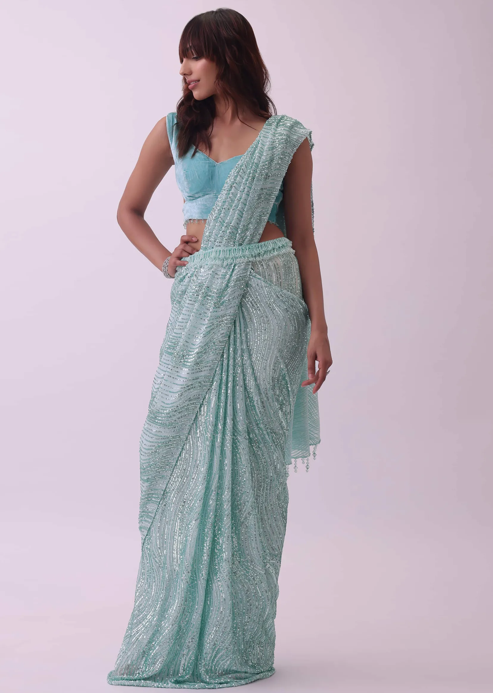 Aqua Blue Saree And Stitched Velvet Blouse With Hanging Crystals