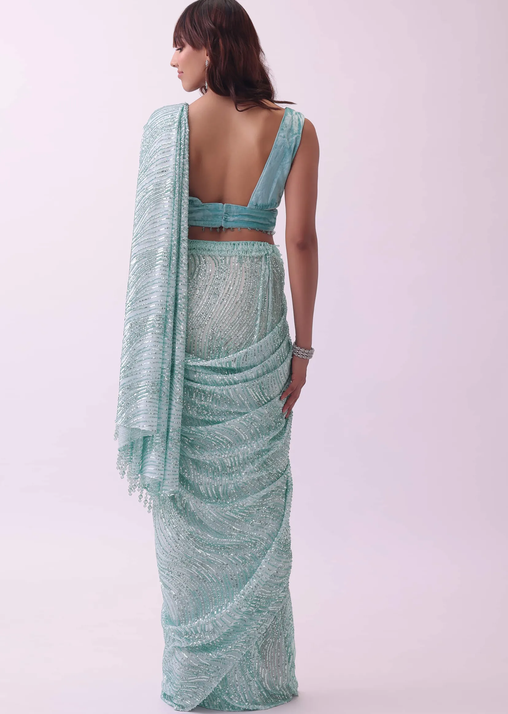 Aqua Blue Saree And Stitched Velvet Blouse With Hanging Crystals