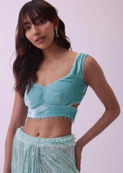 Aqua Blue Saree And Stitched Velvet Blouse With Hanging Crystals