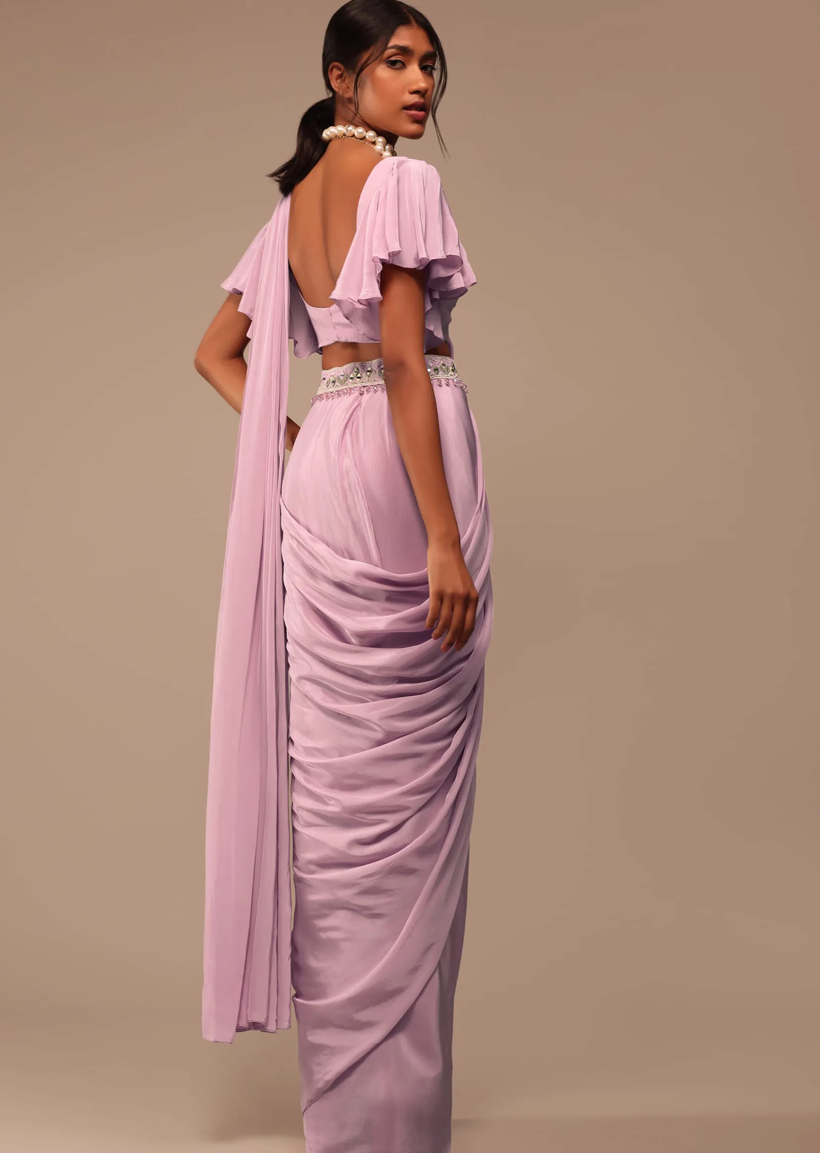 Baby Pink Crepe Saree With Fancy Bow Shaped Blouse And Belt