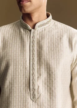 Beige Banarasi Jacquard Kurta Set With Intricate Cutwork
