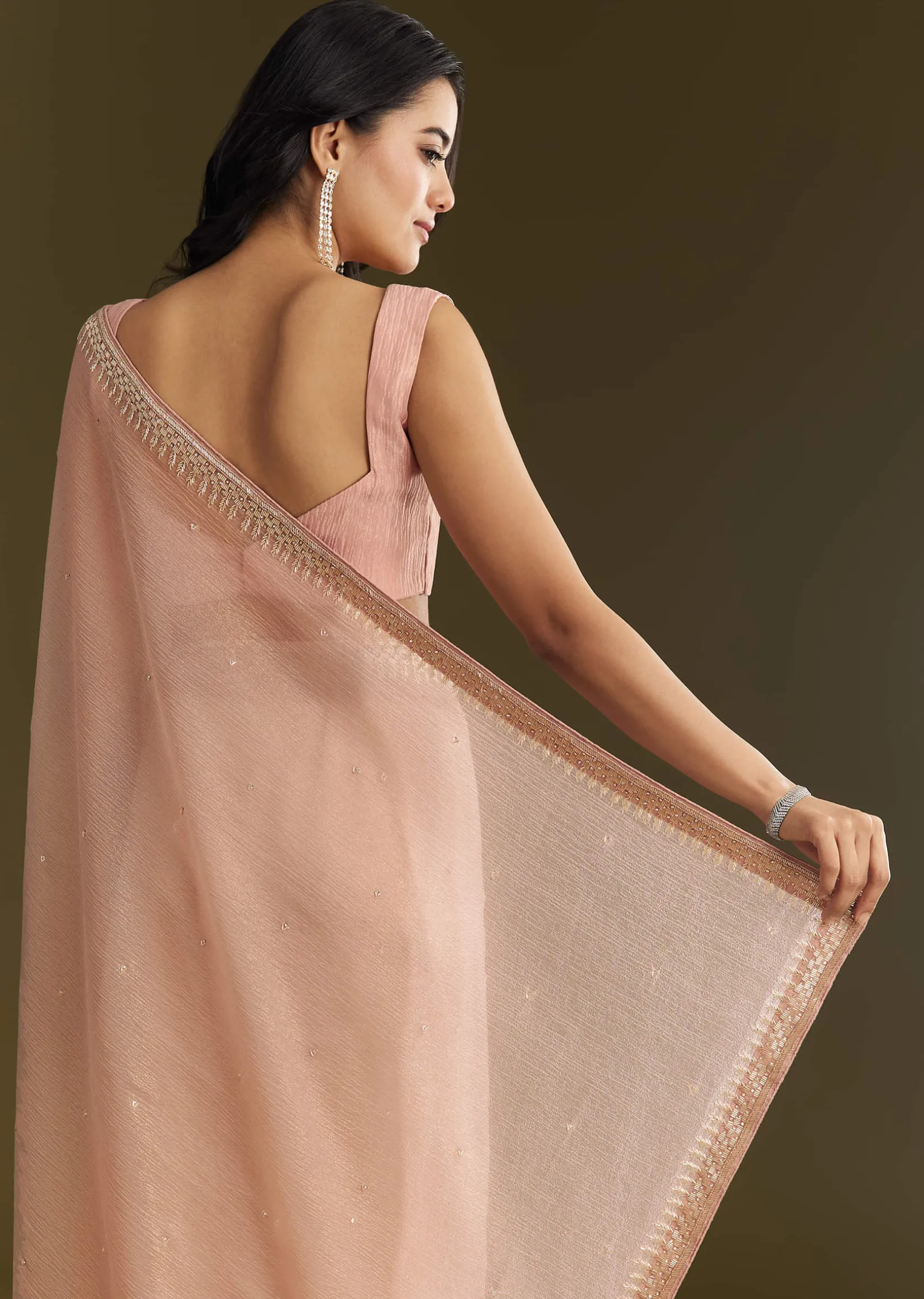 Beige Crushed Tissue Saree With Stone Embellishment And Glossy Finish