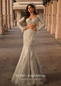 Beige Fish-Cut Lehenga And Blouse With Crystal Tassels