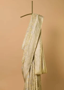Beige South Dharmavaram Silk Saree With Woven Antique Motifs And Unstitched Blouse Fabric