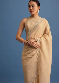 Beige Tissue Saree With Moti And Cutdana Border And Unstitched Blouse