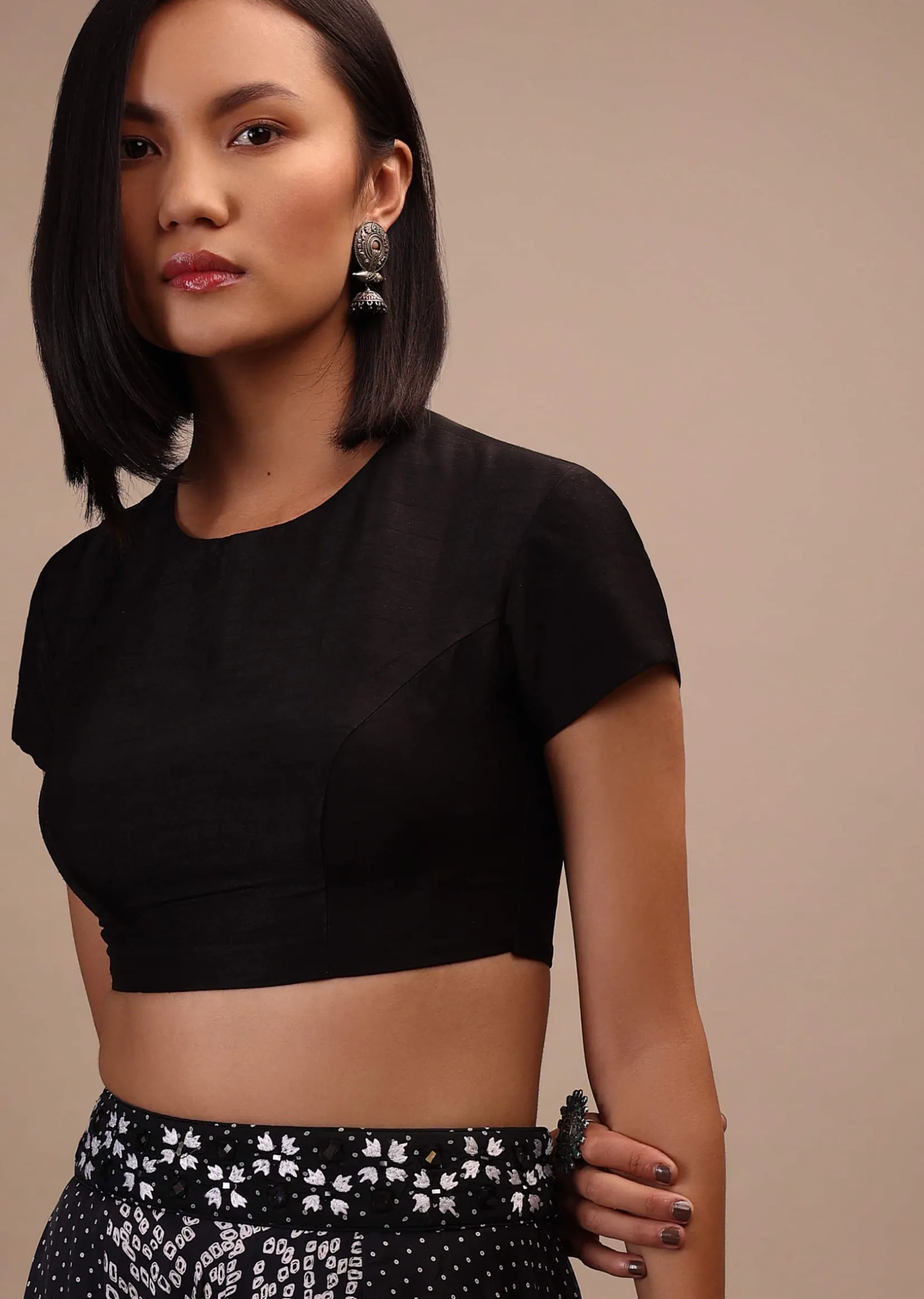 Black Cap Sleeves Blouse In The Round Neck. Raw Silk With Cut Out Back Neck And Hook Closure