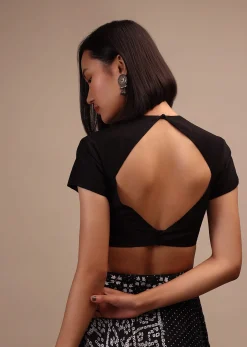 Black Cap Sleeves Blouse In The Round Neck. Raw Silk With Cut Out Back Neck And Hook Closure