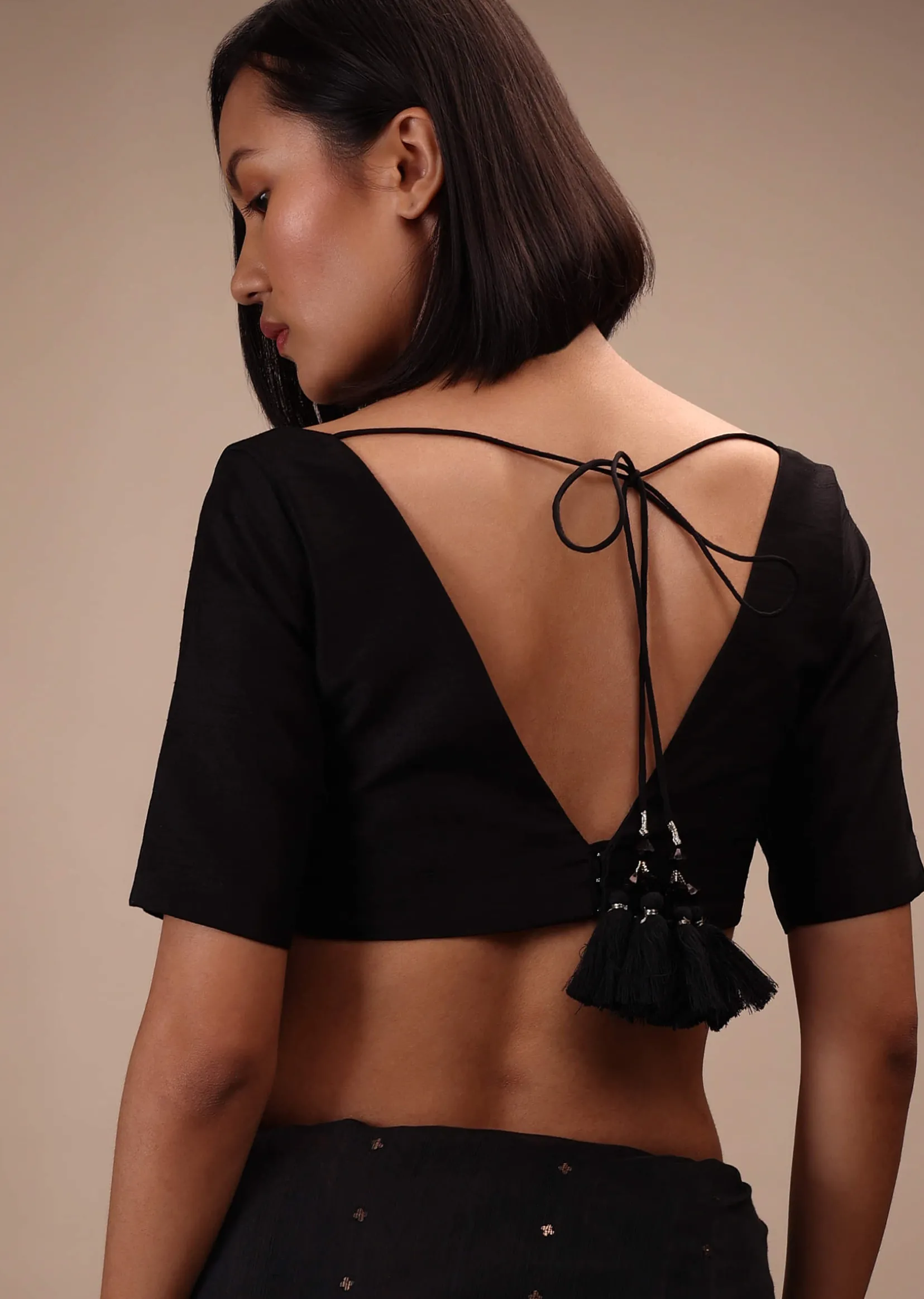 Black Half Sleeves Blouse In Curved V-Neckline Tie-Up Tassel Dori With Back Hook Closure