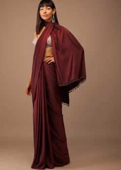 Blood Red Satin Saree With Fringes On The Pallu Paired With Hand Embroidered Bustier