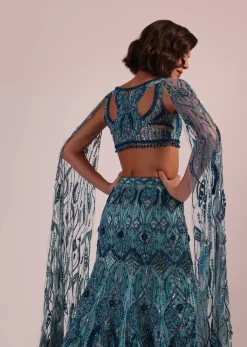 Blue Fish Cut Bridal Lehenga Set With Long Trail Sleeves And Heavy Embroidery