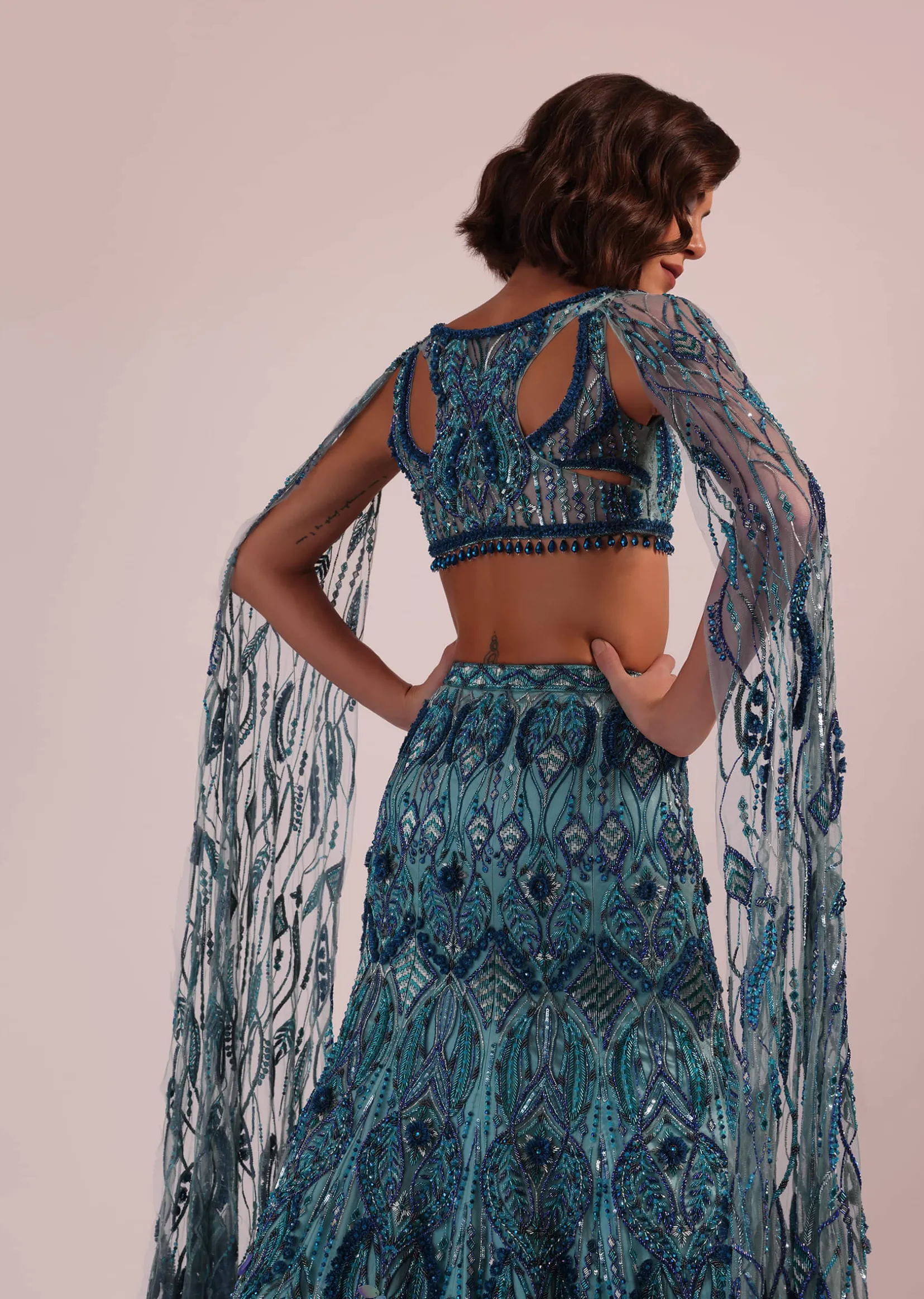 Blue Fish Cut Bridal Lehenga Set With Long Trail Sleeves And Heavy Embroidery