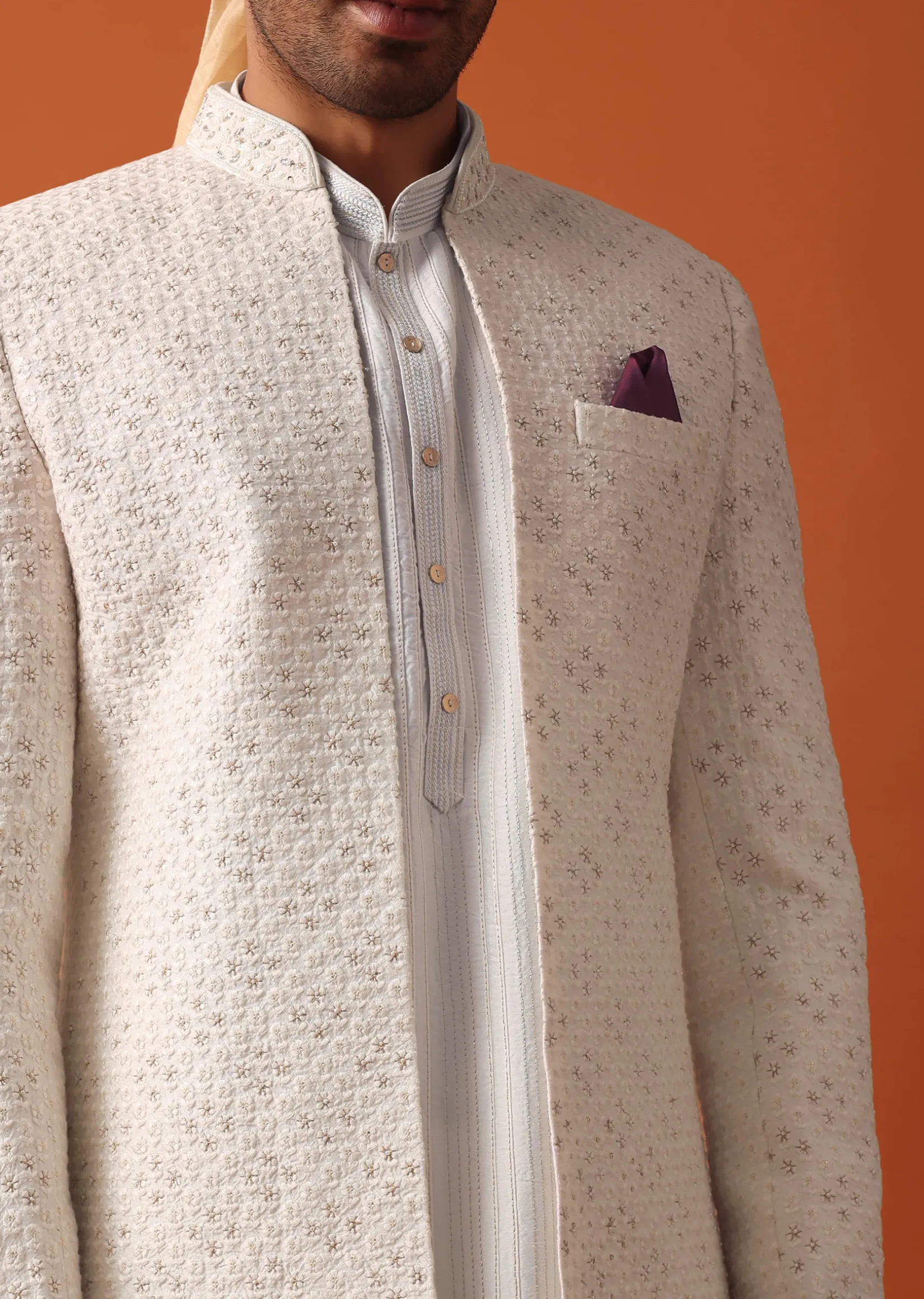 Blush Pink Sherwani Adorned with Intricate Embroidery All Over