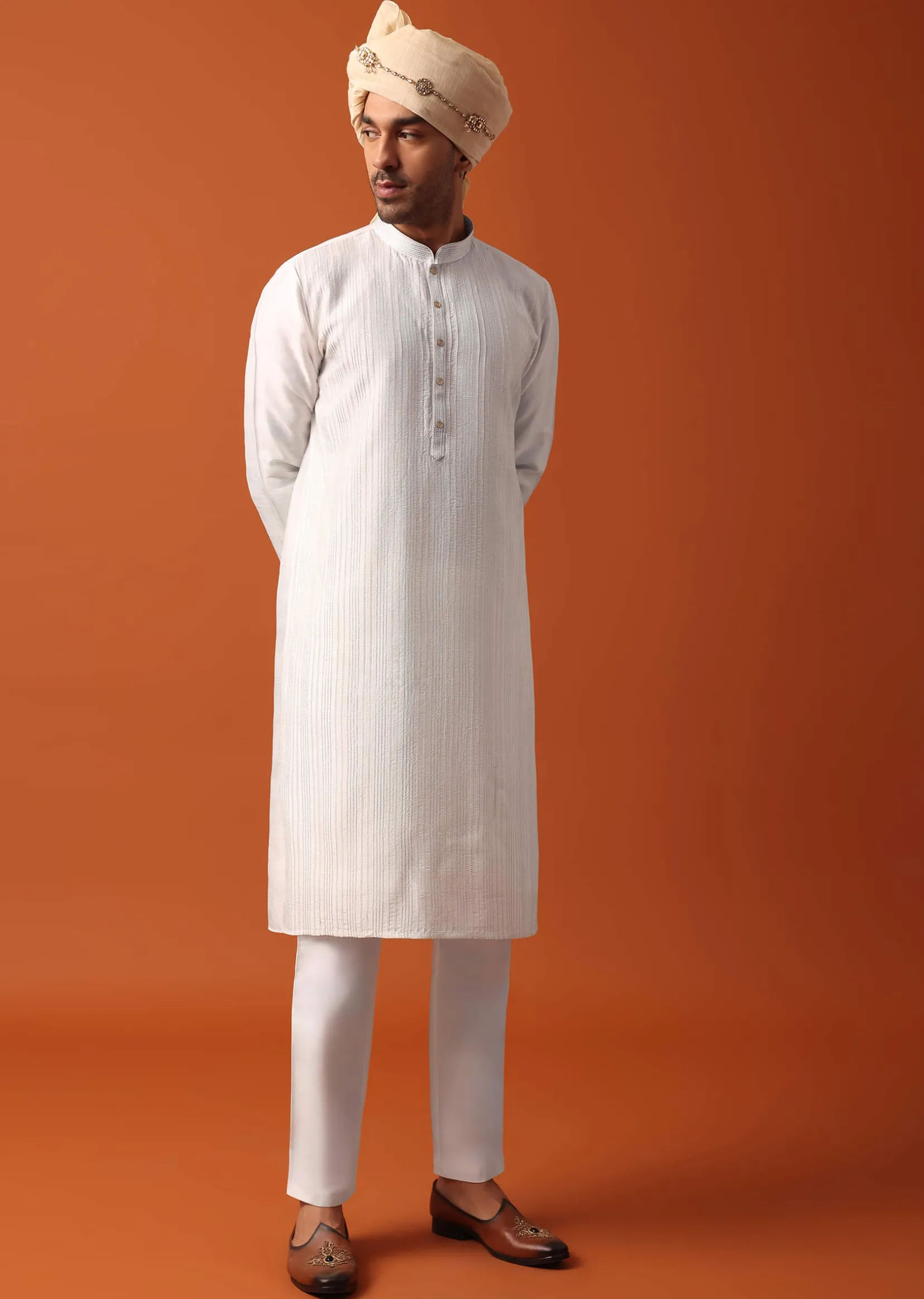 Blush Pink Sherwani Adorned with Intricate Embroidery All Over
