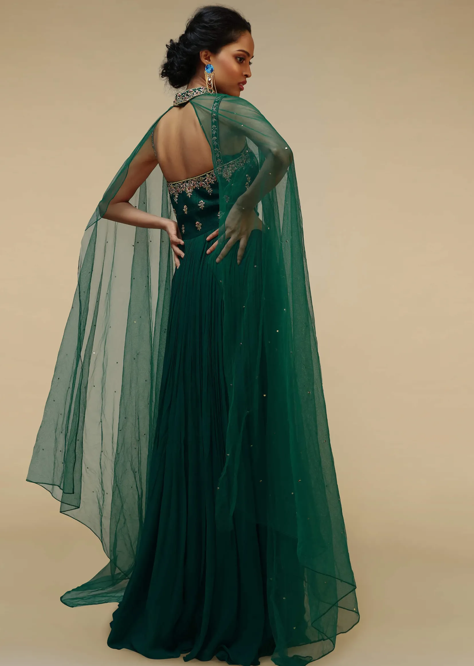 Bottle Green Anarkali Gown With Hand Embroidered Floral Design Using Multi Colored Sequins And Cut Dana Work