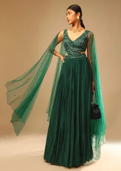 Bottle Green Gown In Crepe With Side Cut Outs In The Hand Embroidered Bodice
