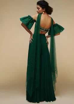 Bottle Green Palazzo Suit With A Cold Shoulder Crop Top Featuring Short Bell Sleeves And Multi Colored Hand Embroidery
