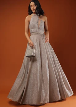 Champagne Gown In Shimmer Crush With Halter Neckline And Pleated Bodice Featuring Sheer Cut Out