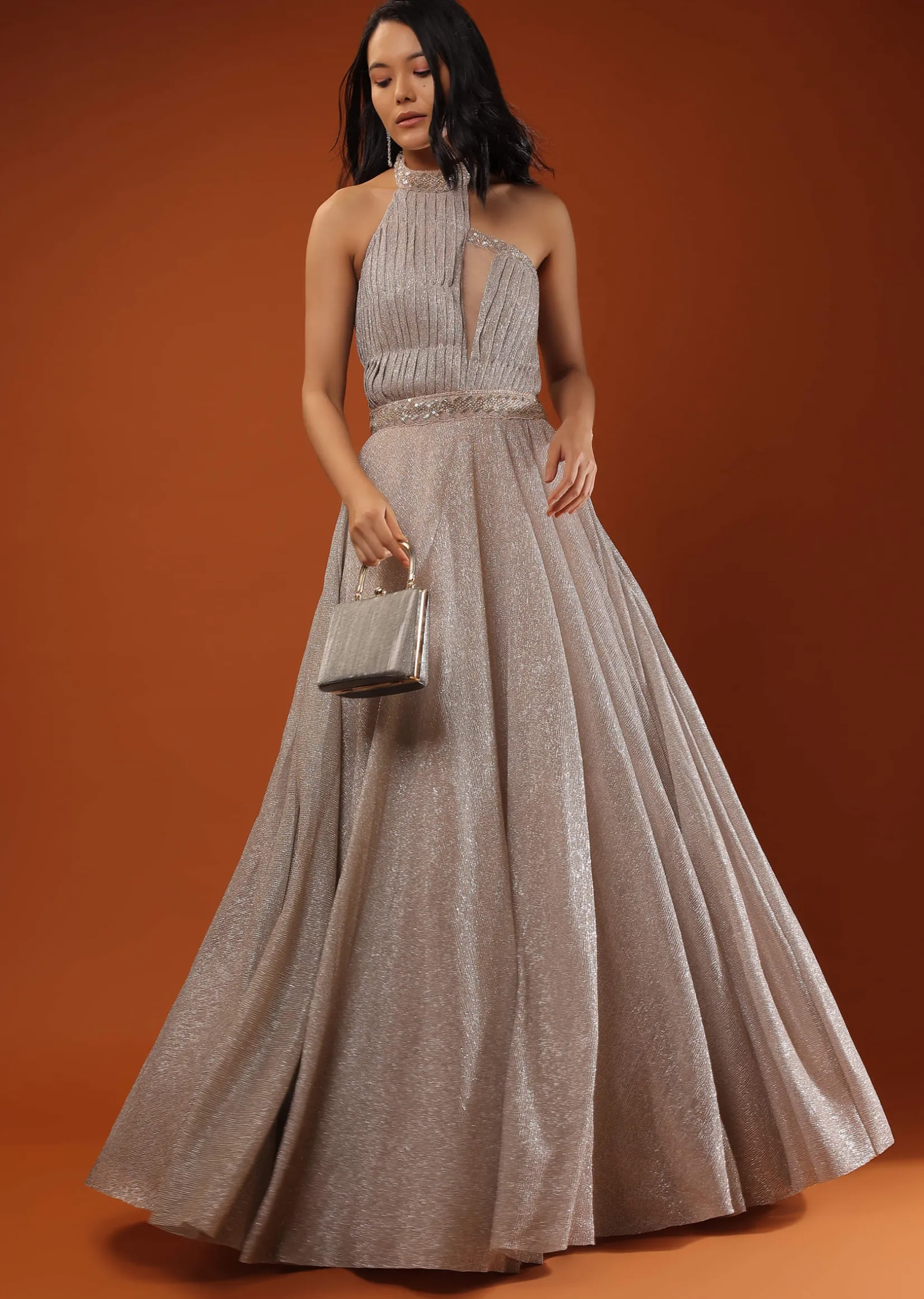 Champagne Gown In Shimmer Crush With Halter Neckline And Pleated Bodice Featuring Sheer Cut Out