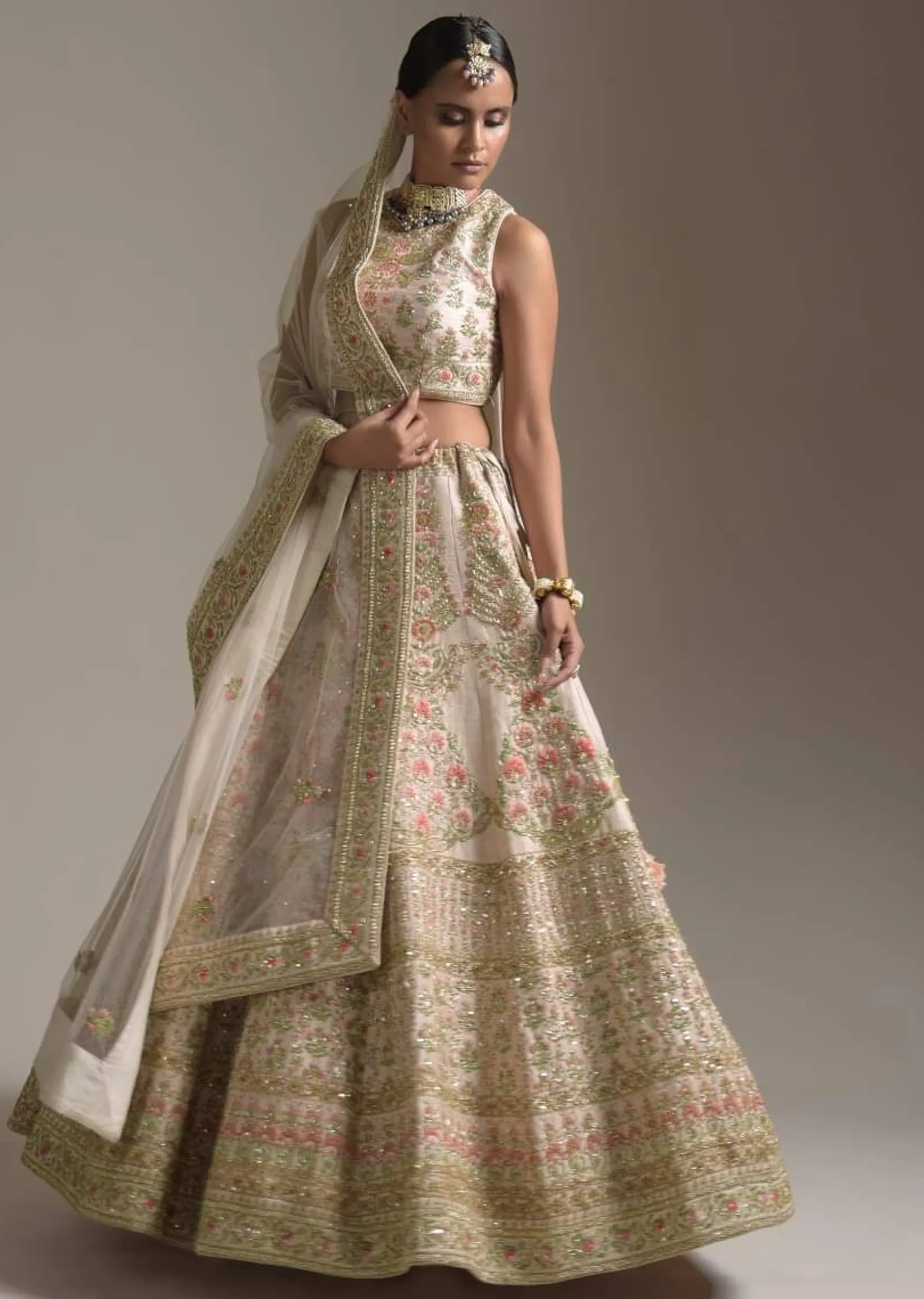 Creamy Pink Lehenga Choli In Raw Silk With Pink Resham And Zardosi Embroidered Floral Kalis Online - Kalki Fashion