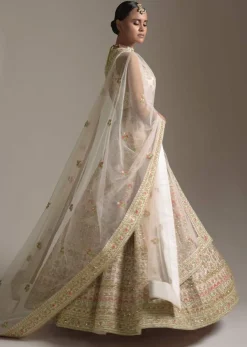 Creamy Pink Lehenga Choli In Raw Silk With Pink Resham And Zardosi Embroidered Floral Kalis Online - Kalki Fashion