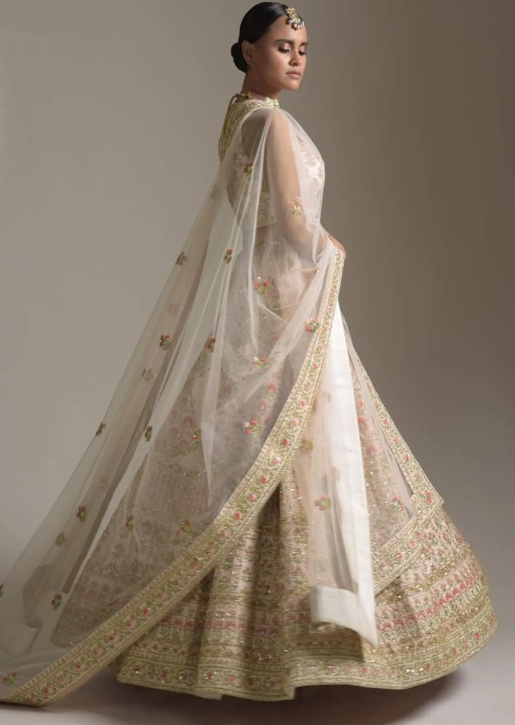 Creamy Pink Lehenga Choli In Raw Silk With Pink Resham And Zardosi Embroidered Floral Kalis Online - Kalki Fashion