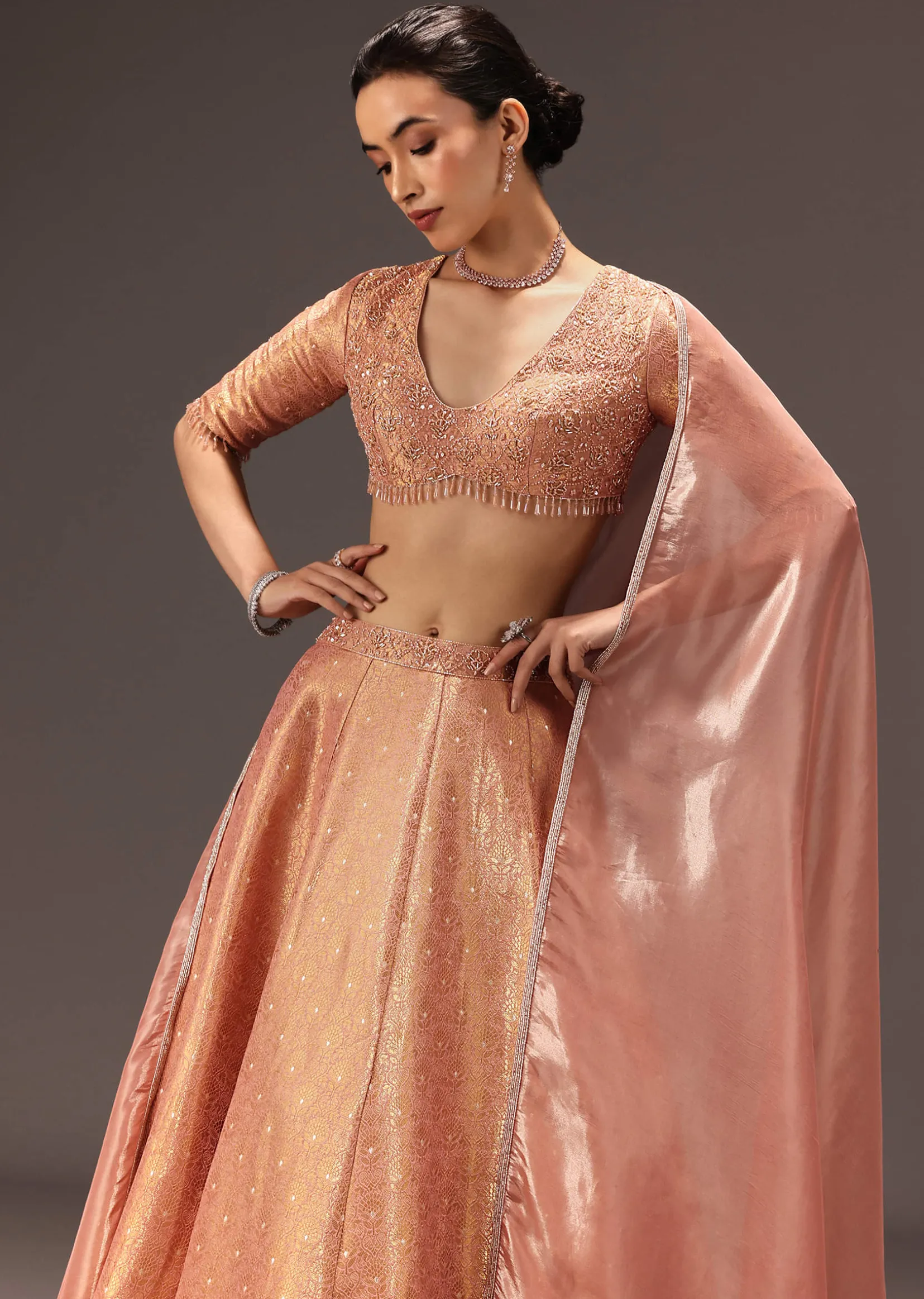 Dusty Peach Banarasi Silk Hand Work Lehenga Set