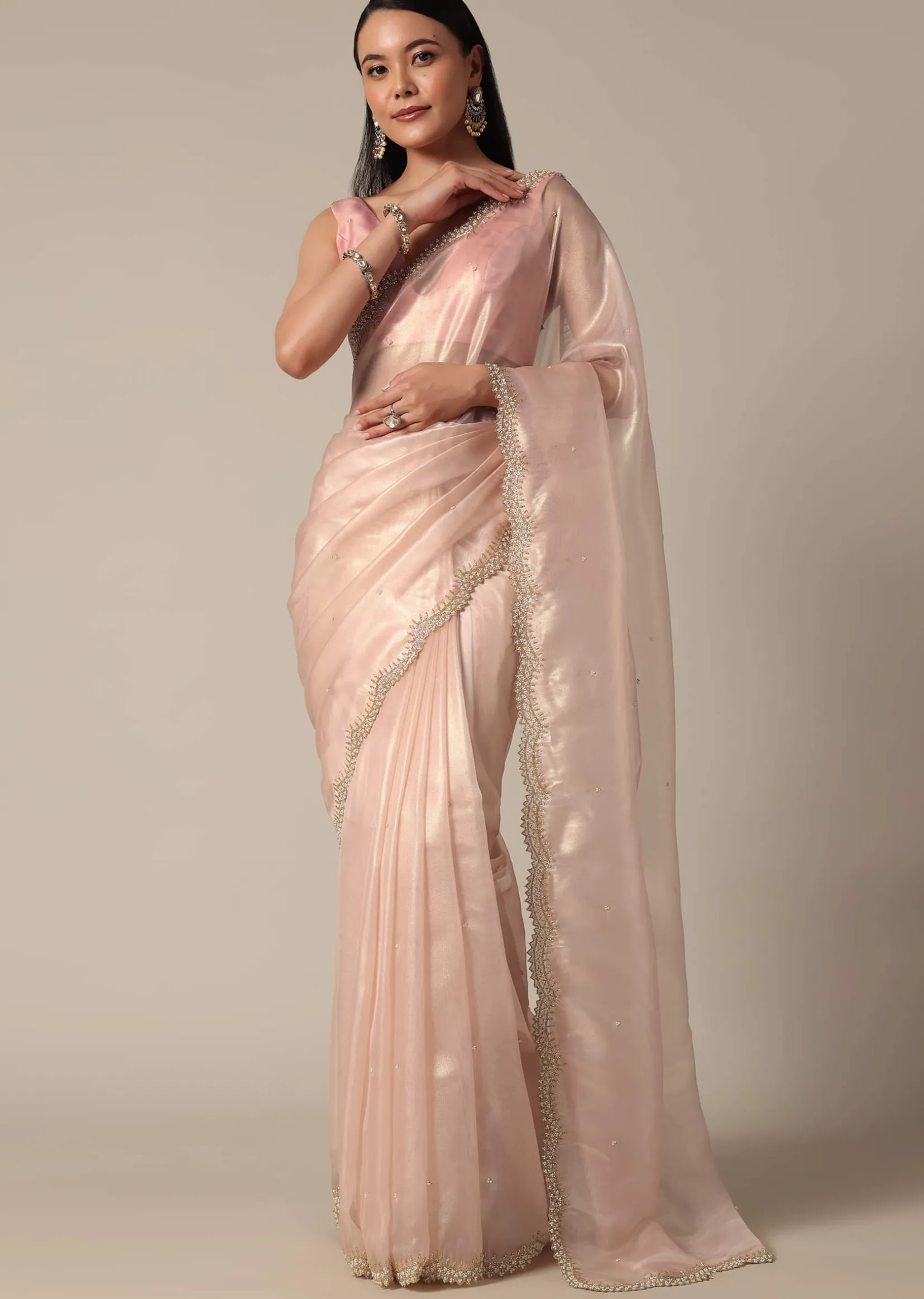 Elegant Peach Saree With Scalloped Border