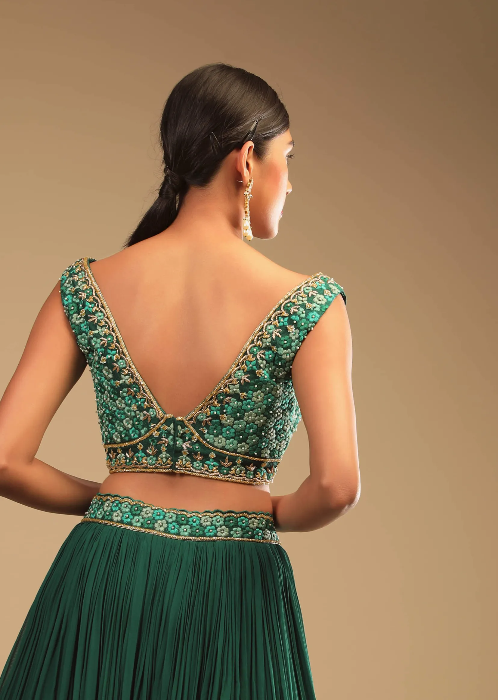 Emerald Green Lehenga In Georgette With A Plunging Neck Crop Top Featuring Floral Hand Work And Choker Dupatta