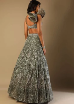 Fern Green Lehenga Choli In Net With Stone Hand Embroidered Floral Motifs And Fancy Origami Cones On The Shoulder