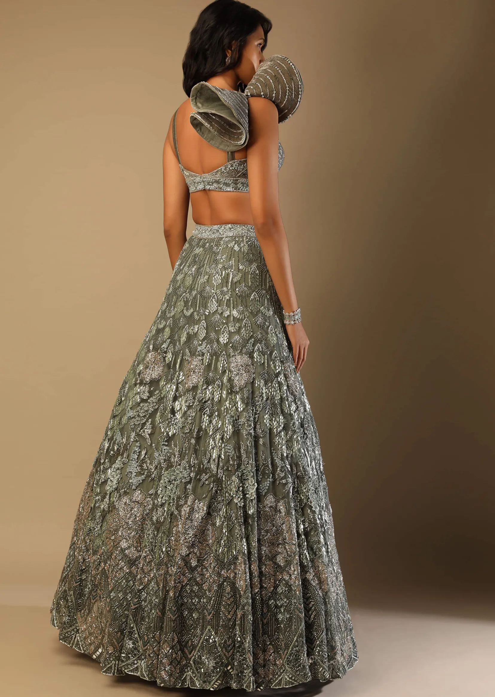 Fern Green Lehenga Choli In Net With Stone Hand Embroidered Floral Motifs And Fancy Origami Cones On The Shoulder