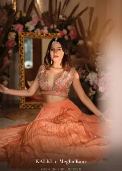 Fusion Coral Skirt In Crepe With Hand Embroidered Raw Silk Choli With Plunging Neckline