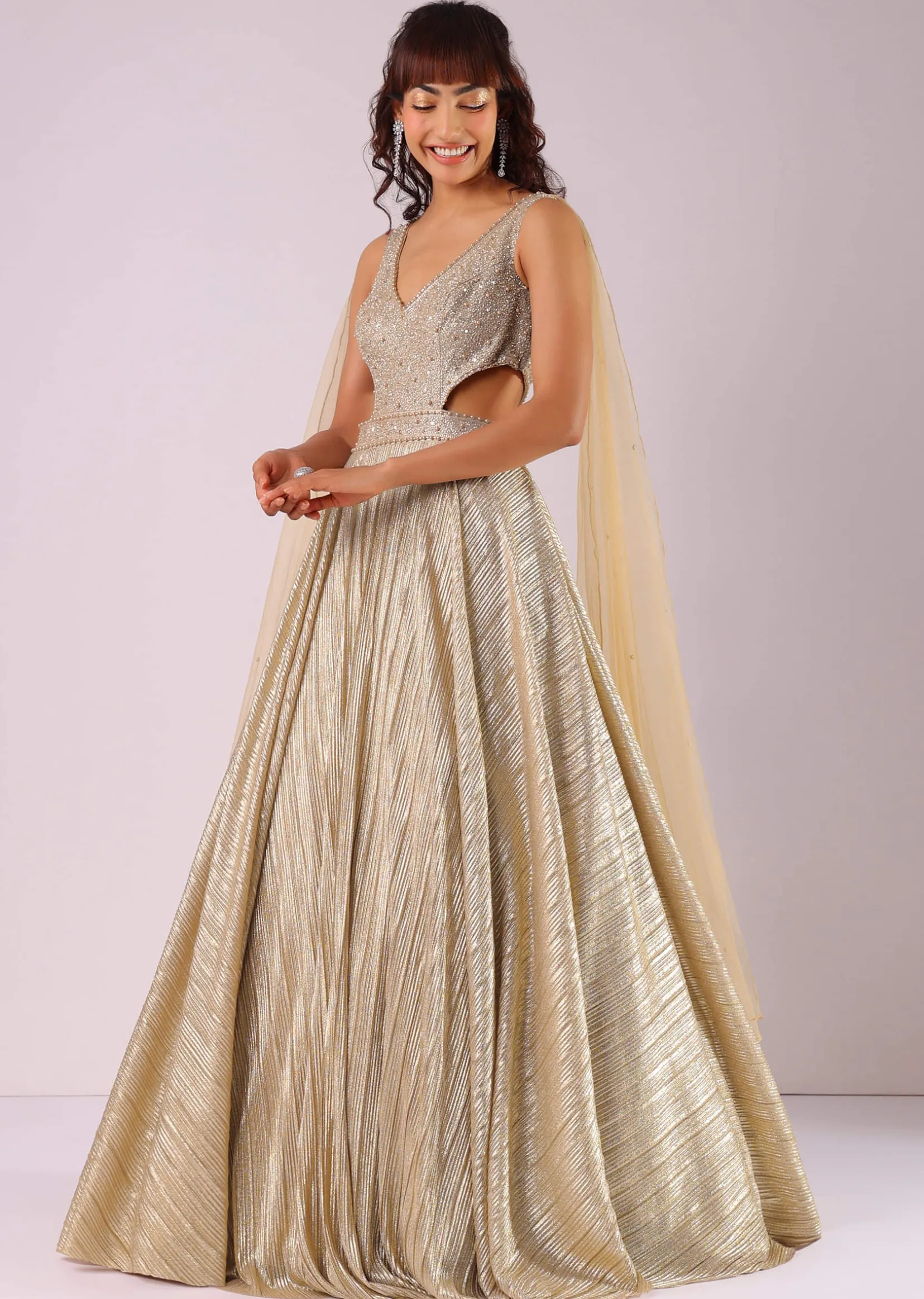 Glam Gold Embroidered Gown In Knit Fabric With Net Trail Wings