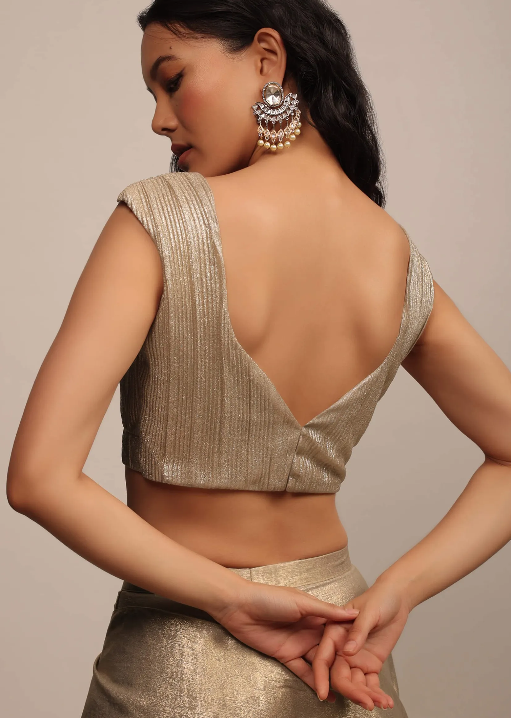 Glittery Gold Cap Sleeve Blouse In Gold Pleated Fabric With A Sweetheart Neckline