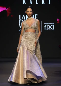 Gold Banarasi Embroidered Long Jacket With Sleeveless Blouse And Fishcut Lehenga