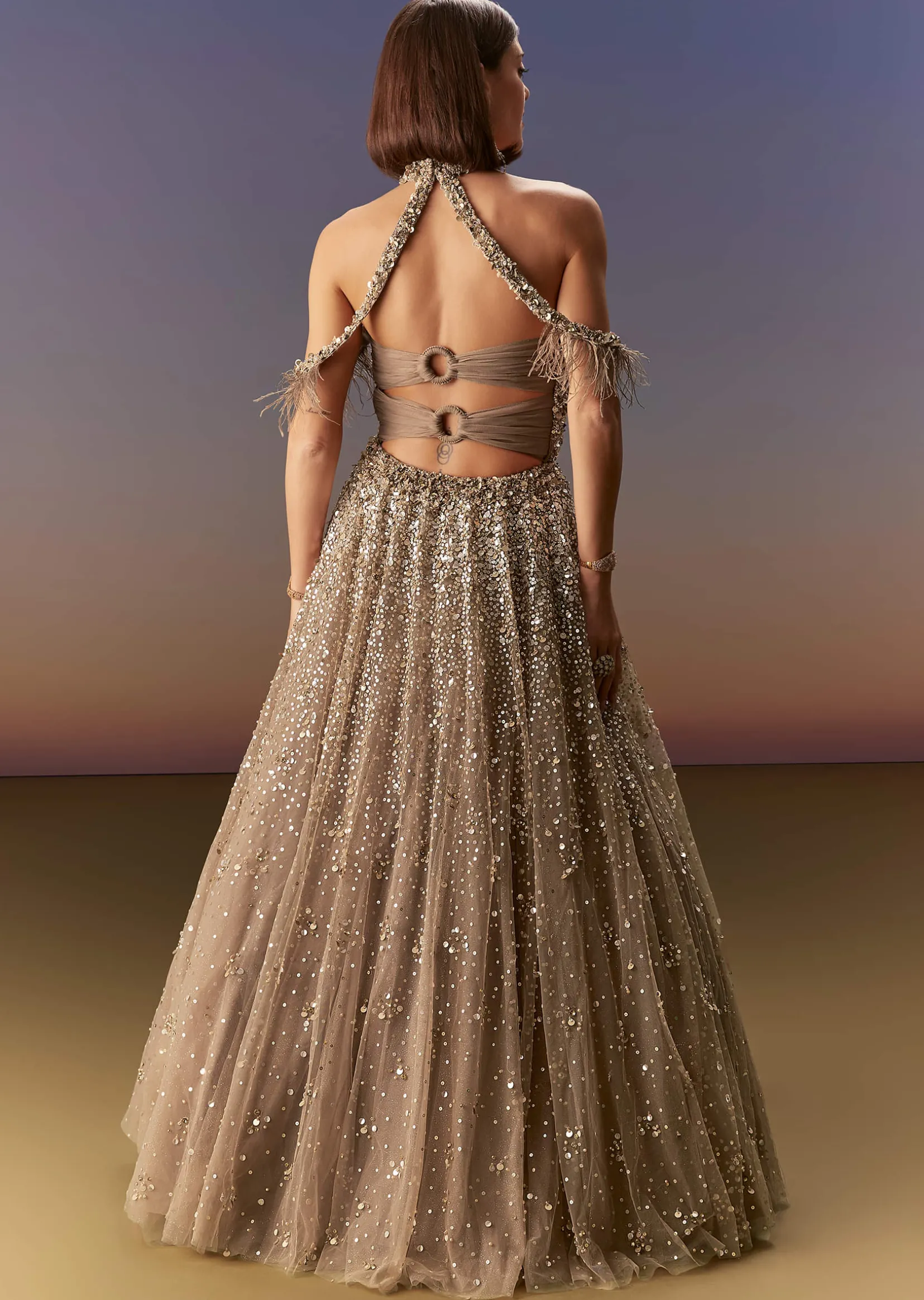 Gold Halter Neck Gown With Cut Out Back And Embellished Bodice