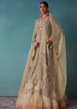 Gold Toned Embroidered Bridal Lehenga And Heavy Tube Top With Jacket