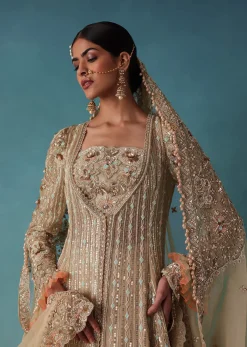 Gold Toned Embroidered Bridal Lehenga And Heavy Tube Top With Jacket