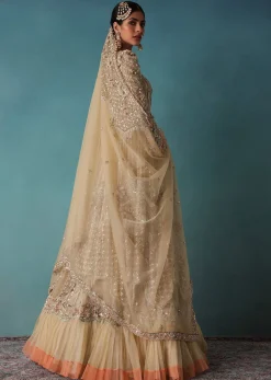 Gold Toned Embroidered Bridal Lehenga And Heavy Tube Top With Jacket