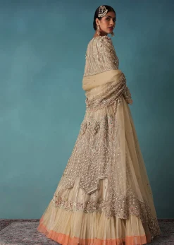 Gold Toned Embroidered Bridal Lehenga And Heavy Tube Top With Jacket
