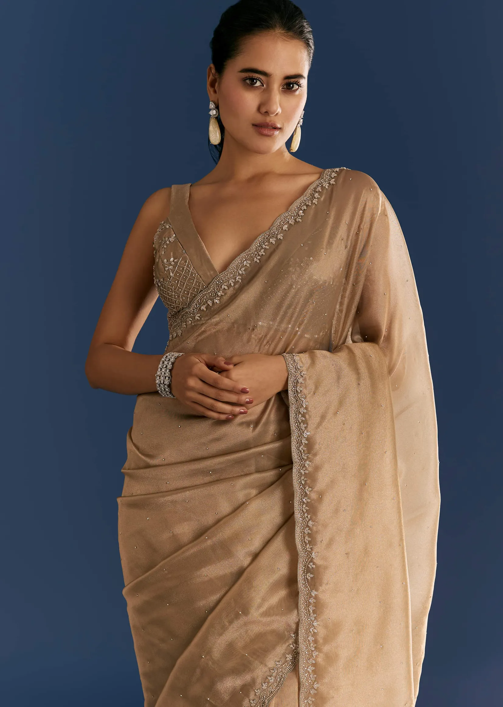 Golden Beige Organza Tissue Saree With Cut Dana And Stone Embellishments