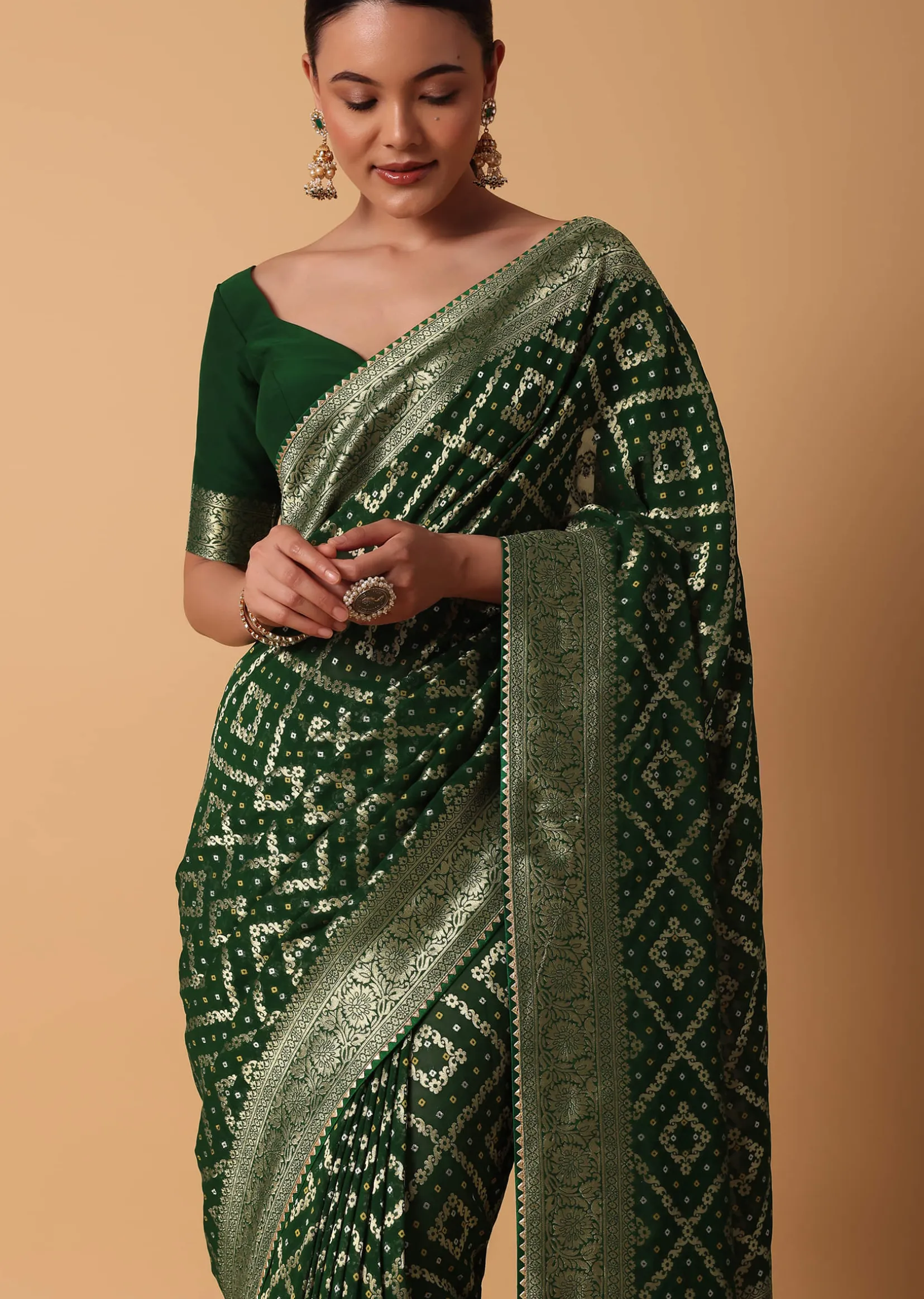 Green Banarasi Georgette Saree With Zari Bandhani Weave And Unstitched Blouse Piece