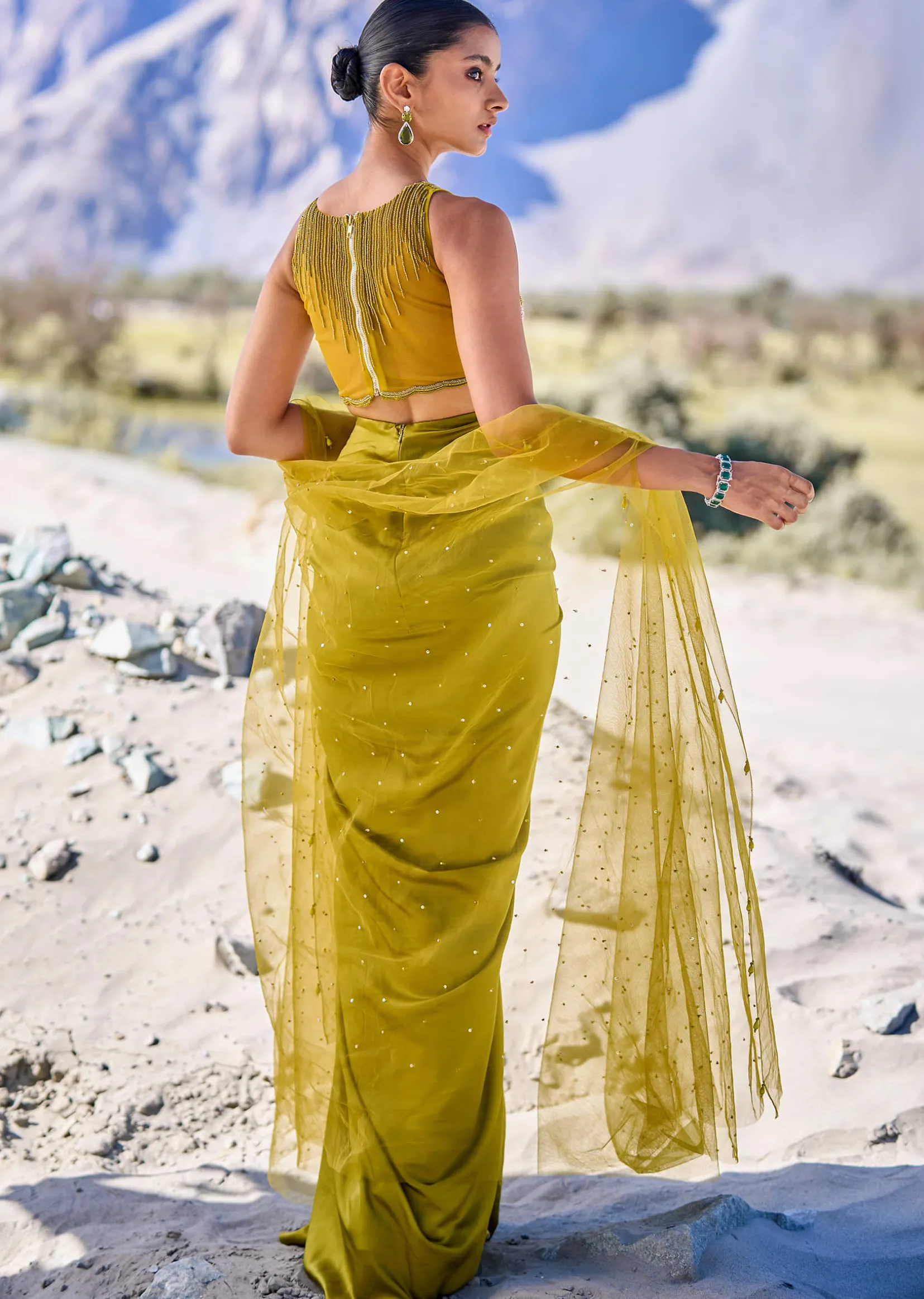 Green Satin Drape Skirt With Embroidered Blouse And Net Cape