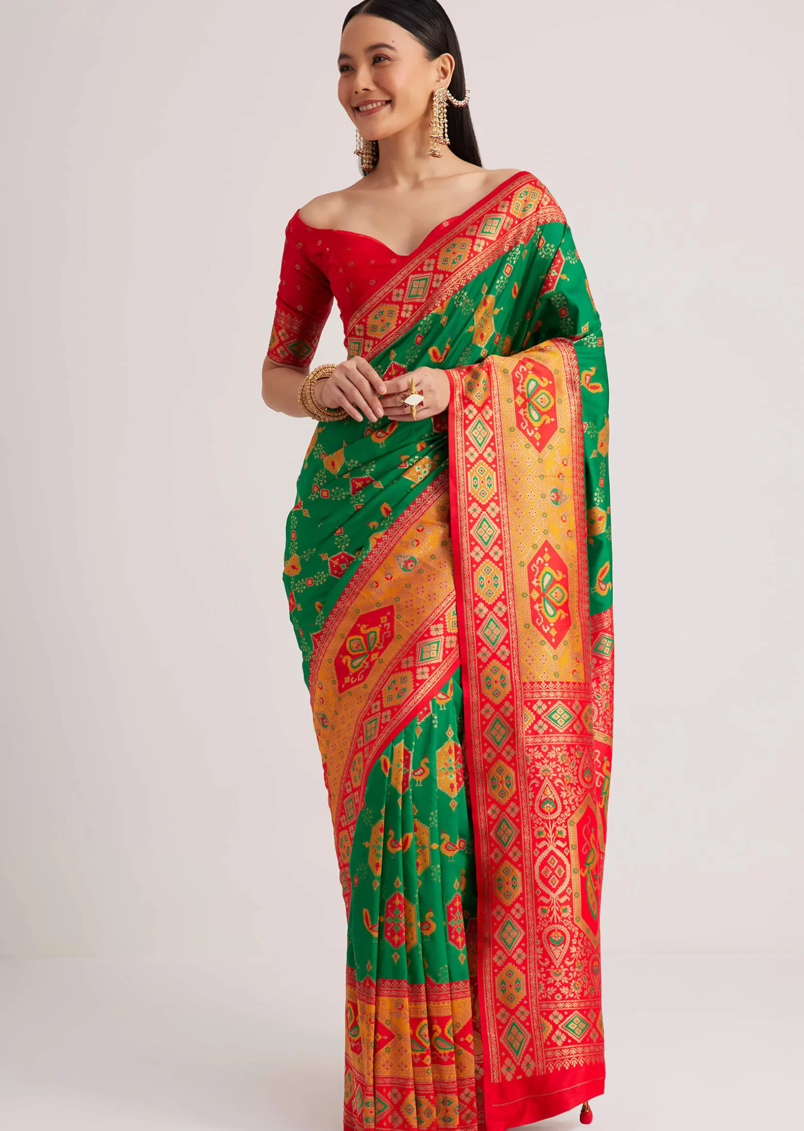 Green Silk Woven Ikat Motif Saree With Constrat Pallu