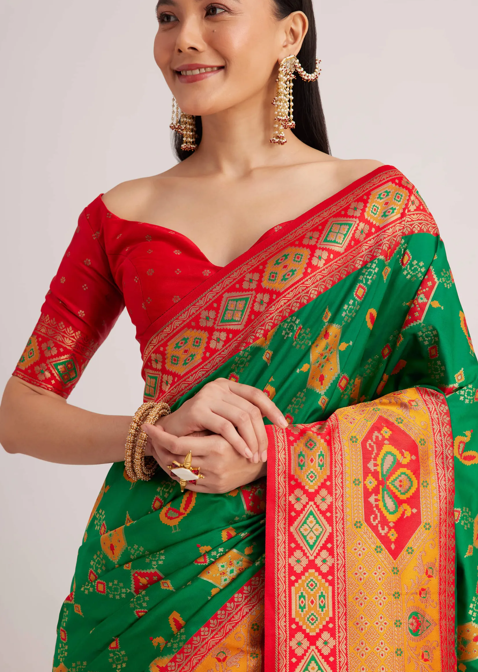 Green Silk Woven Ikat Motif Saree With Constrat Pallu