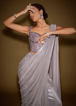 Grey Embellished Corset Blouse With Draped Saree And Tassel Detailing