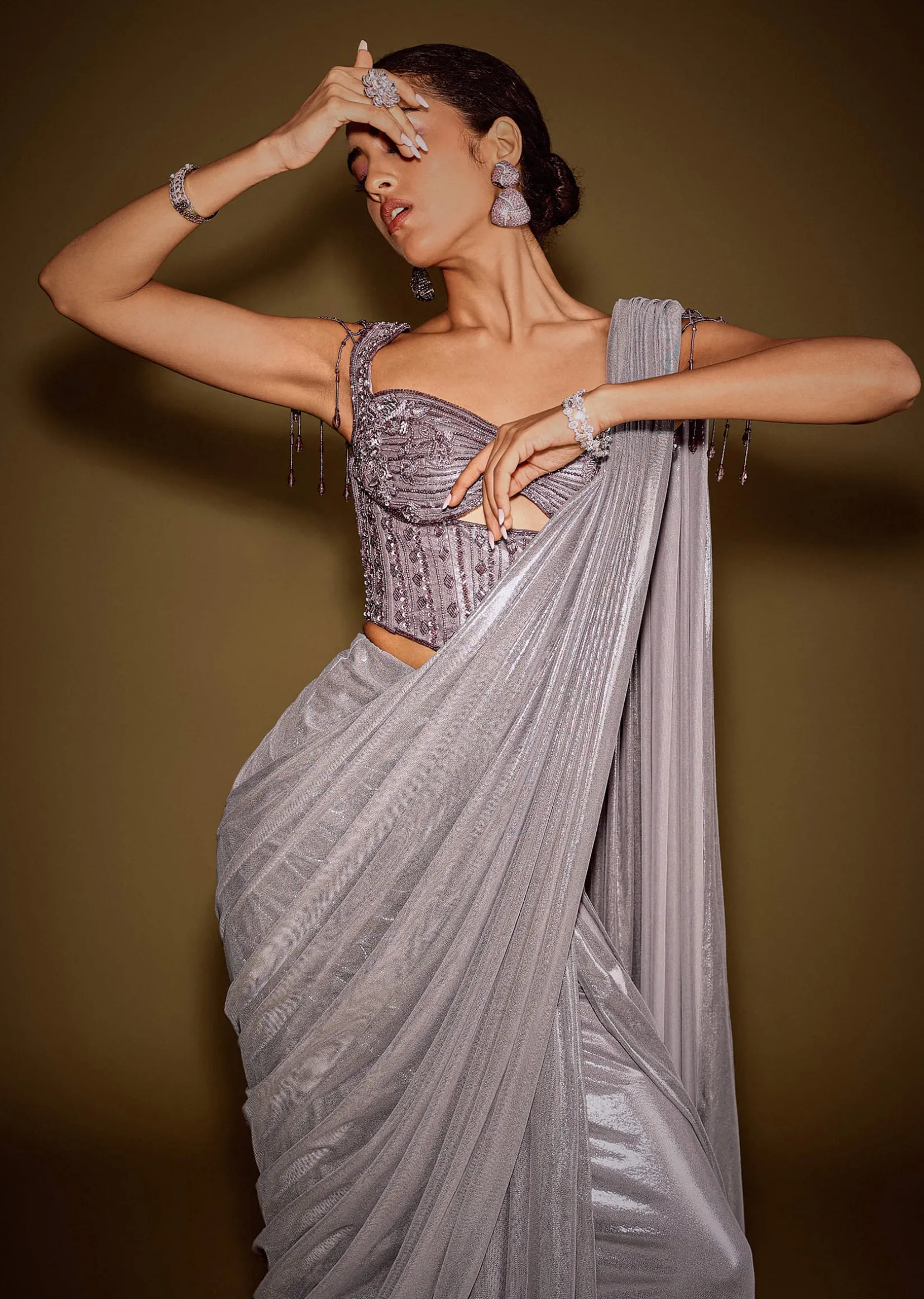 Grey Embellished Corset Blouse With Draped Saree And Tassel Detailing