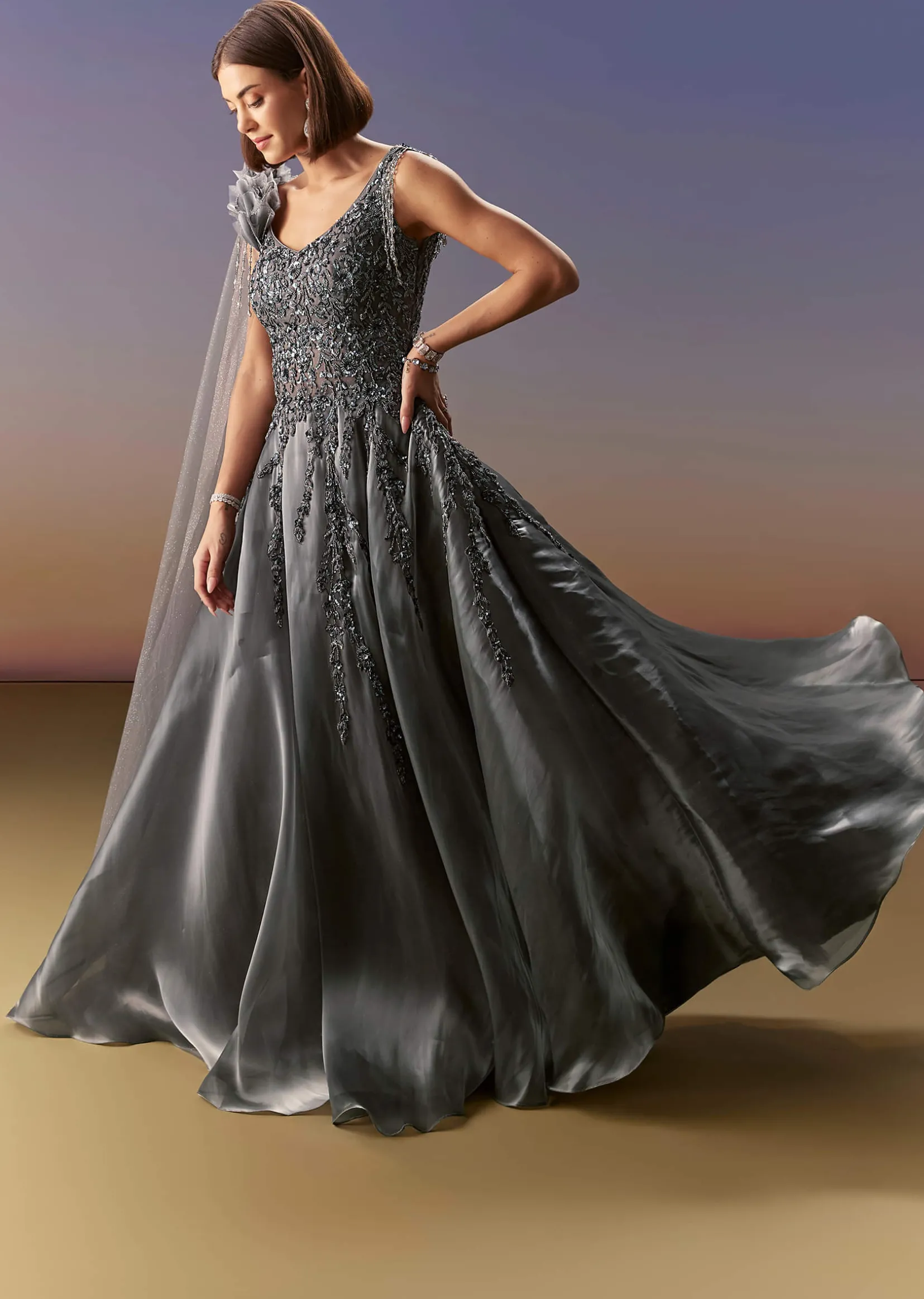 Grey Sleeveless Gown With Soft Net Trail And Shimmer