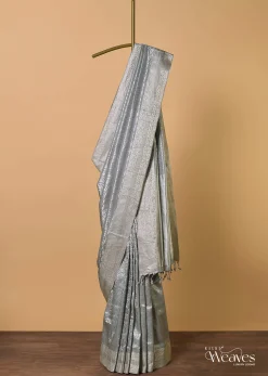 Grey South Silk Saree With Abstract Zari Border And Unstitched Blouse Fabric